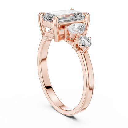 Step-Cut Center with Multi-Shape Diamond Side Accents