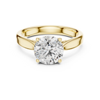 Brilliant Round Diamond in a Seamless Interlaced Cathedral Mount