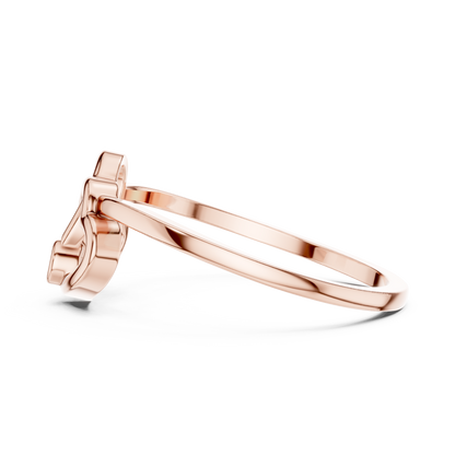 A Sculptural Double Heart Ring with a Radiant Diamond Accent